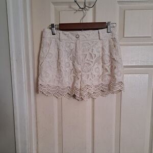Monteau shorts outer shell is lacey/embroidery. bottom is crochet